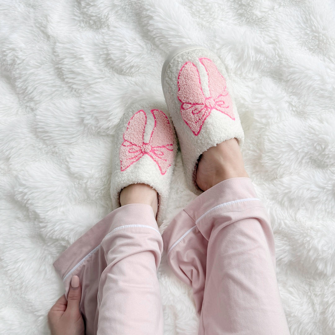 Pink bow plush slippers